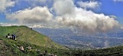 60 Nuvoloni meridiani vagano sul Linzone e sulla pianura